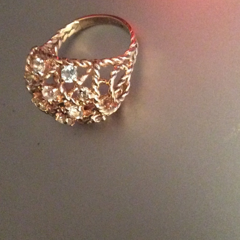10k Solid Gold ring with Cubic Zirconiums .